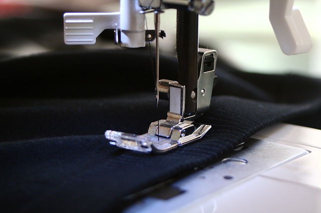sewing machine repairing torn clothes