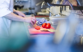 cutting tomatoes