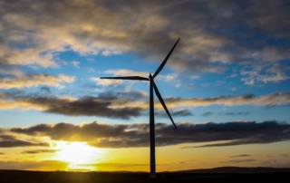 Image of a windmill at sunset